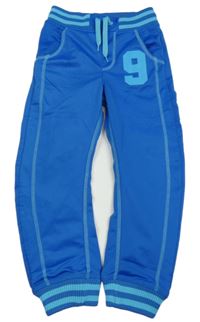 Modré sportovní tepláky s číslem a pruhy H&M