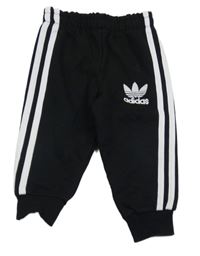 Černé tepláky s pruhy Adidas