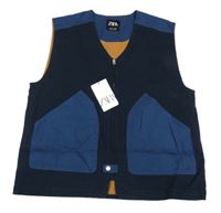 Nové - Tmavomodro-modrá riflová vesta Zara 