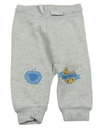 Světlešedé tepláky s příšerkou H&M