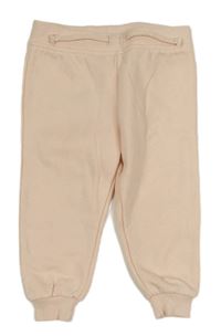 Světlerůžové cuff tepláky Primark 