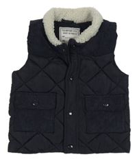 Tmavomodrá prošívaná šusťákovo/manšestrová zateplená vesta Matalan