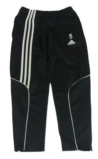 Černé sportovní tepláky s pruhy a logem Adidas