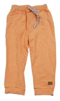 Oranžové pruhované tepláky Topomini