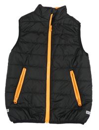 Černo-oranžová šusťáková prošívaná zateplená vesta 