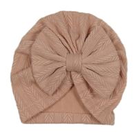 Růžová vzorovaná turbanová čepice s mašlí