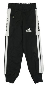 Černé sportovní tepláky s bílým pruhem a logem - Adidas