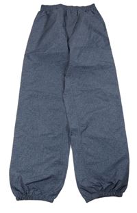 Tmavomodré melírované šusťákové voděodolné kalhoty TCM