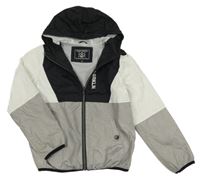 Šedo-černo-bílá šusťáková jarní bunda s kapucí 