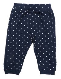 Tmavomodré tepláky s bílými srdíčky C&A