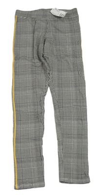 Nové - černo-bílé kostkované vzorované legíny s pruhy H&M