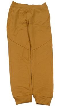 Hnědé tepláky s nášivkou DKNY