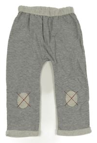 Šedé melírované baggy tepláky s nášivkami na kolenou