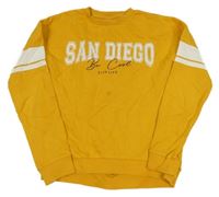 Pomerančová mikina s nápisem 