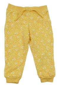 Žluté puntíkaté tepláky s květinami Primark