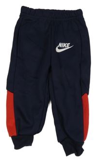 Tmavomodré sportovní tepláky s logem - Nike