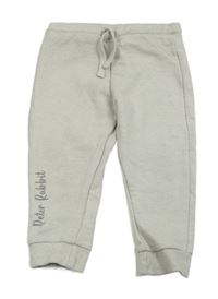 Béžové melírované tepláky s nápisem - Peter Rabbit