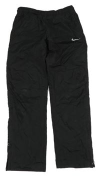 Černé funkční šusťákové sportovní kalhoty Nike 