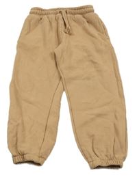 Béžové tepláky Next