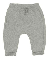 Světlešedé prošívané baggy tepláky Tu