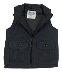 Tmavomodrá šusťáková zateplená vesta zn. F&F