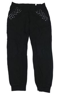 Černé tepláky s cvočky H&M