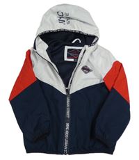 Bílo-červeno-tmavomodrá šusťáková jarní bunda s kapucí 