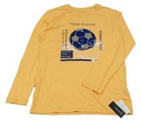 Nové - světleoranžové triko s míčem z překlápěcích flitrů a nápisy St. Bernard