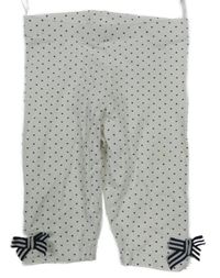 Bílo-tmavomodré puntíkaté crop legíny s mašlemi C&A