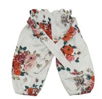 Bílé saténové kalhoty s květy a páskem