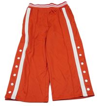 Červené sportovní tepláky s bílým pruhem Next