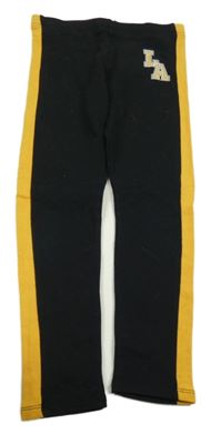 Černé legíny s okrovým pruhem a písmeny 