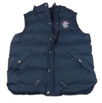 Tmavomodrá šusťáková zateplená vesta s výšivkou 