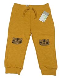Okrové tepláky s tygry Primark