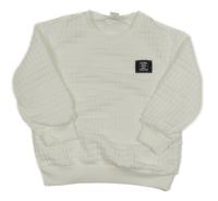 Bílá vzorovaná mikina s nápisem Shein