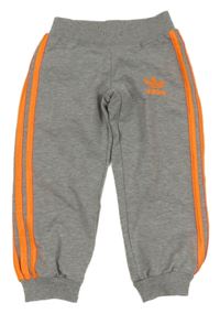 Šedo-křiklavě oranžové melírované capri tepláky Adidas