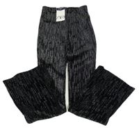 Nové - černé třpytivé flare sametové kalhoty ZARA
