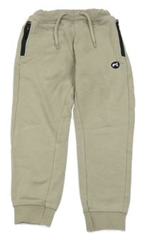 Béžové tepláky s výšivkou Name it