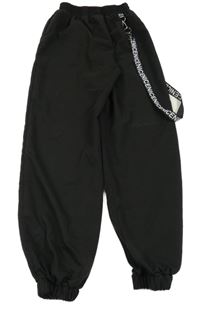 Černé šusťákové cuff kalhoty s řemínky Iefiel