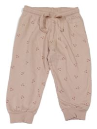 Pudrové tepláky s třešničkami H&M