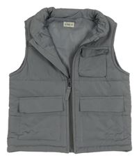 Šedá šusťáková zateplená vesta s kapsami F&F