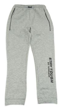 Šedé tepláky s nápisem Y.F.K.