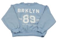 Světlemodrá oversize mikina s nápisem Page one young