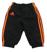 Černé šusťákové podšité kalhoty s logem Adidas