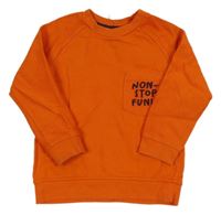 Oranžová mikina s nápisem Nutmeg