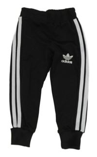 Černé sportovní tepláky s pruhy a logem Adidas