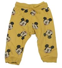 Okrové tepláky s Mickeym H&M
