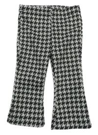 Černo-smetanové vzorované zvonové teplákové kalhoty Ergee 