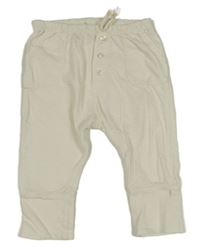 Smetanové lehké tepláky s kapsami 