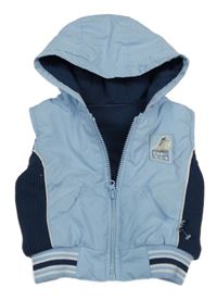 Světlemodro-tmavomodrá šusťáková zateplená vesta s kapucí St. Bernard